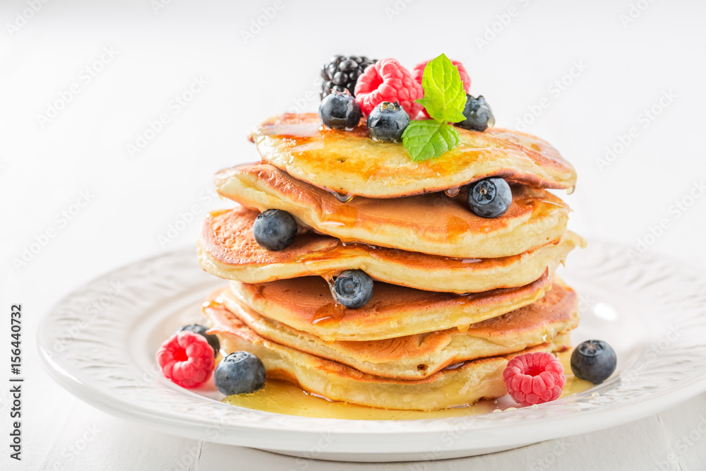 Yummy american pancakes with fresh berry fruits Yummy american pancakes with fresh berry fruits