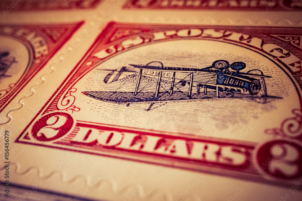 Inverted Jenny U.S. postage stamp with airplane upsidedown Stock Photo