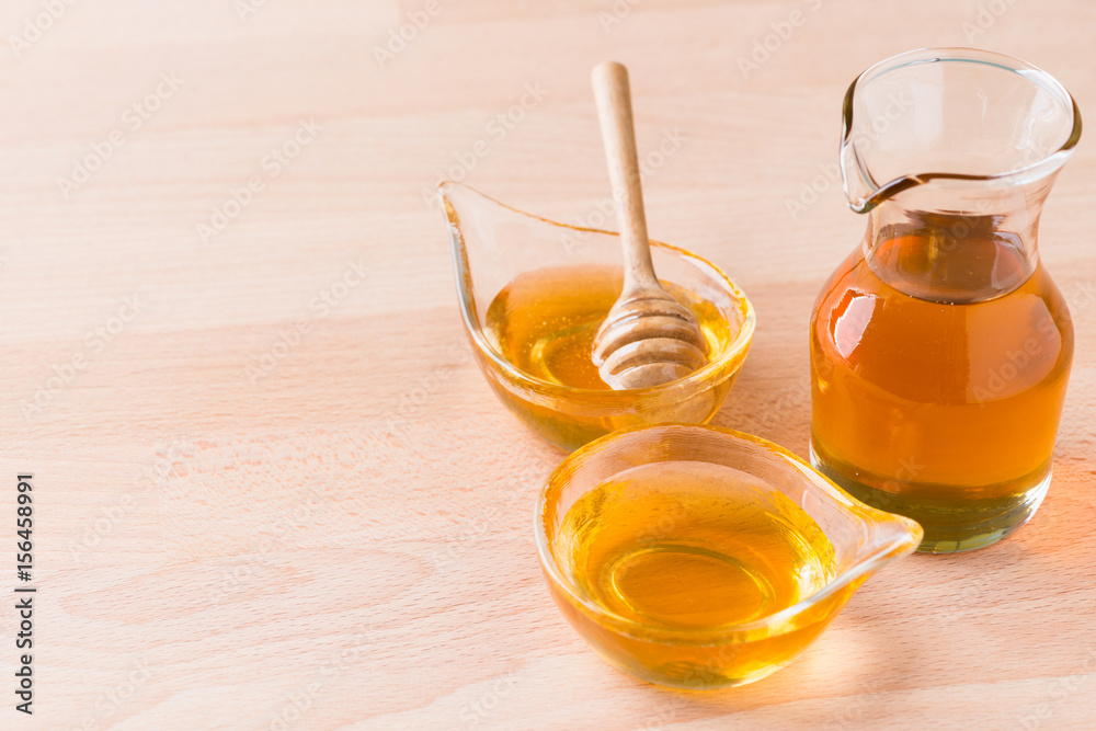 Honey with dipper Honey with dipper