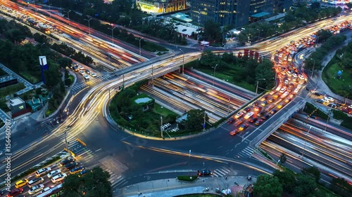 Freeway busy city rush hour heavy traffic jam highway from day to night.