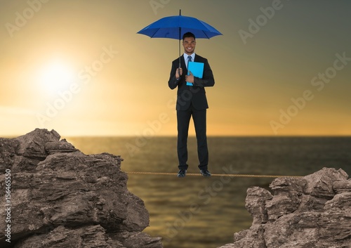 Digital composite image of businessman standing 