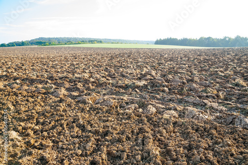 Autumnal plowed field in the sunshine © audaxl