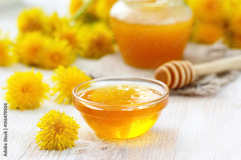 Flower honey in glass bowl Flower honey in glass bowl