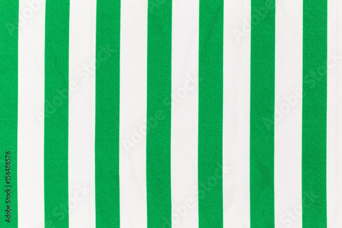 Fabric with white and green stripes.