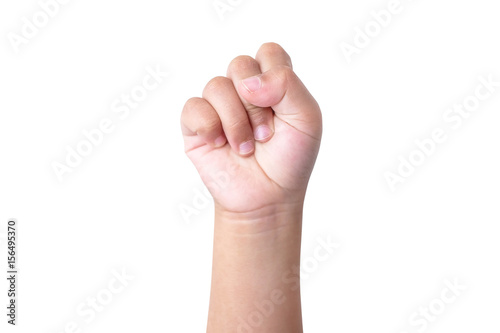 Child's hand making a symbol of victory, isolated on a white background
