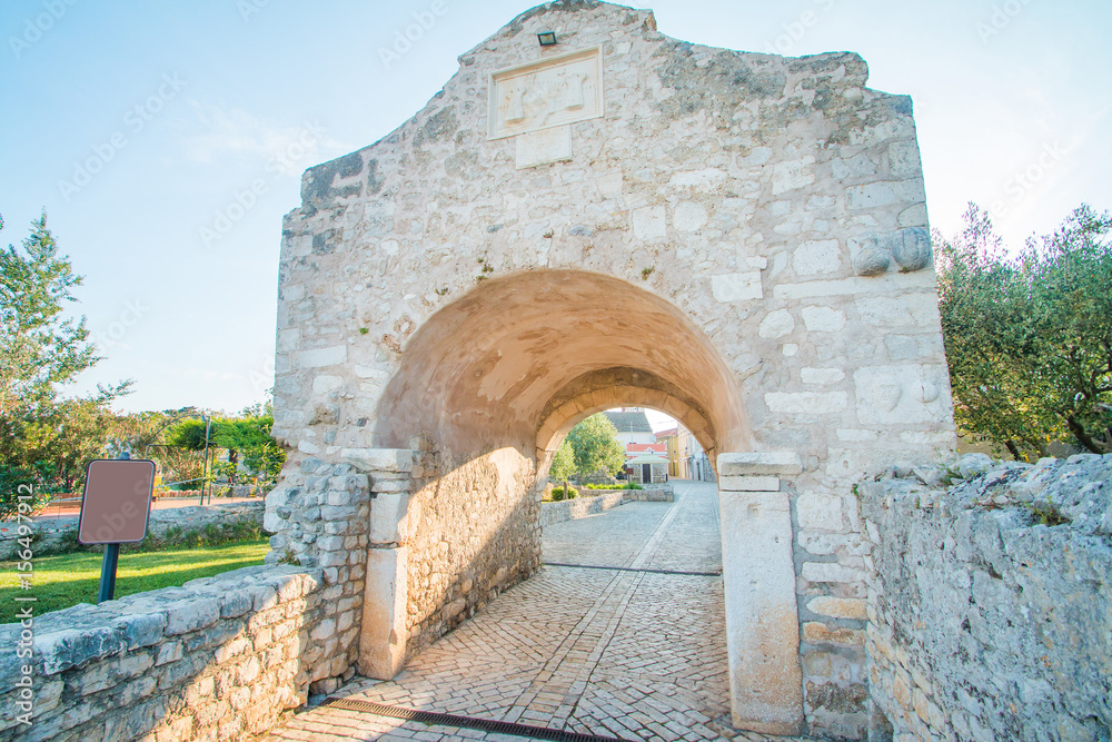 Old lowet town gate in medieval historic town of Nin, Dalmatia, Croatia
