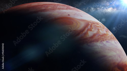 Fototapeta Naklejka Na Ścianę i Meble -  planet Jupiter lit by the Sun, in front of the Milky Way 