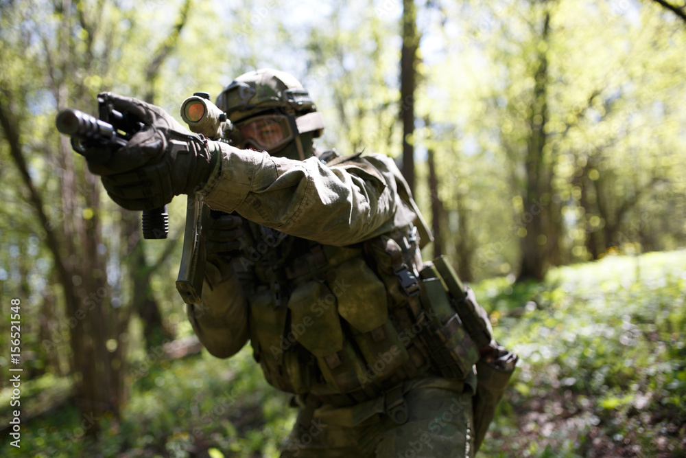 Soldier with weapons in intelligence Soldier with weapons in intelligence