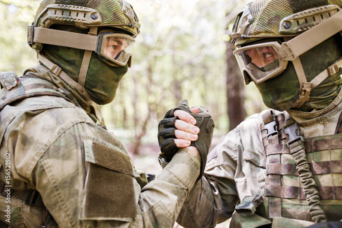 Two military men shaking hands