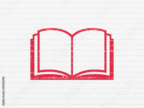 Learning concept: Book on wall background