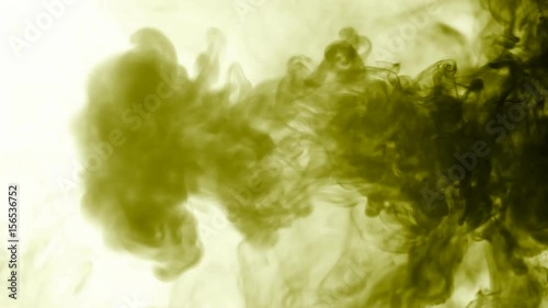 Vapor like smoke at radioactive olive in white background. Vape smoke rings in motion at vape clouds.