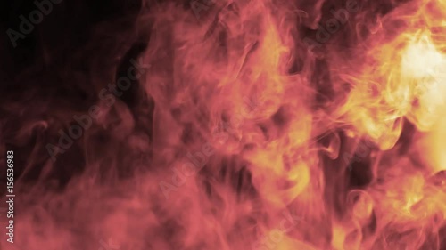 Vapor like smoke fire red styling on a dark black background. Vape smoke rings in motion at vape clouds.