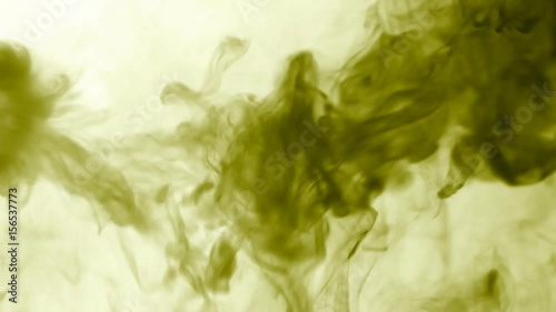 Vapor like smoke at radioactive olive in white background. Vape smoke rings in motion at vape clouds.
