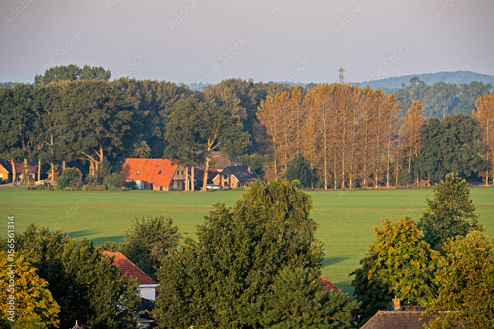 High angle view of farmhouse in dutch rural summer landscape.