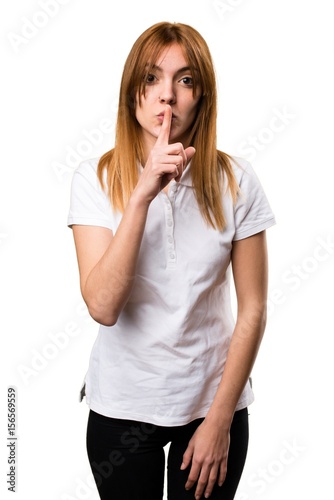 Beautiful young girl making silence gesture