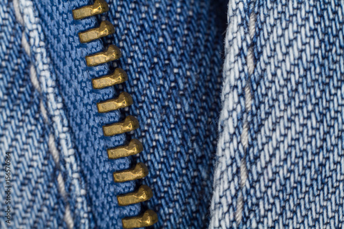 Blue jeans zipper closeup macro