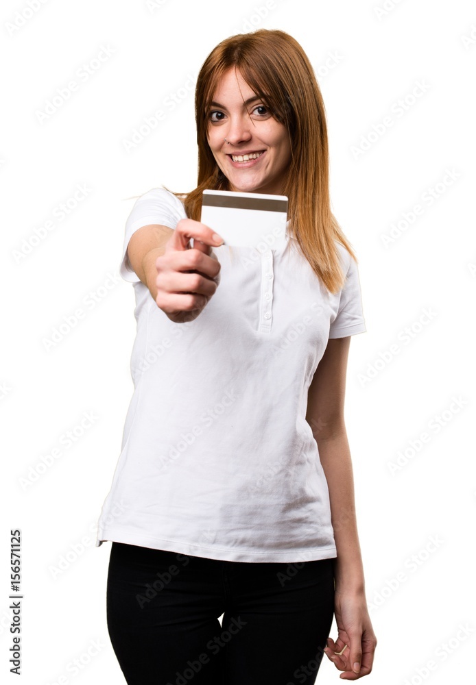 Happy Beautiful young girl holding a credit card Happy Beautiful young girl holding a credit card