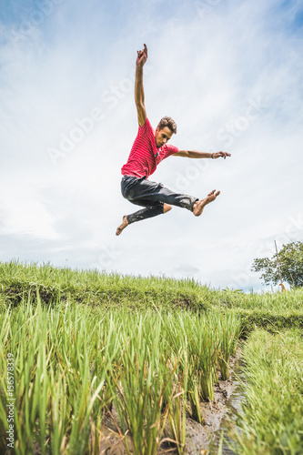 Freerunning in rice fields in Canggu, Bali