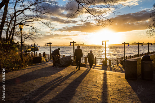 Photography Stunning sunset in South Cove Park along the waterfront New York City