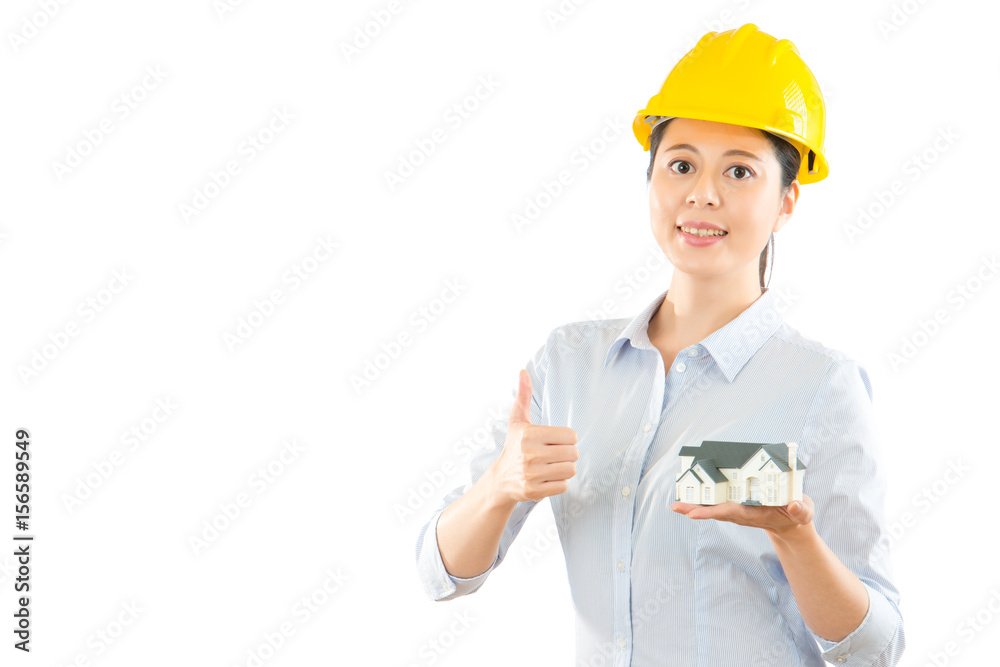 photo of thumbing up young lady architect photo of thumbing up young lady architect