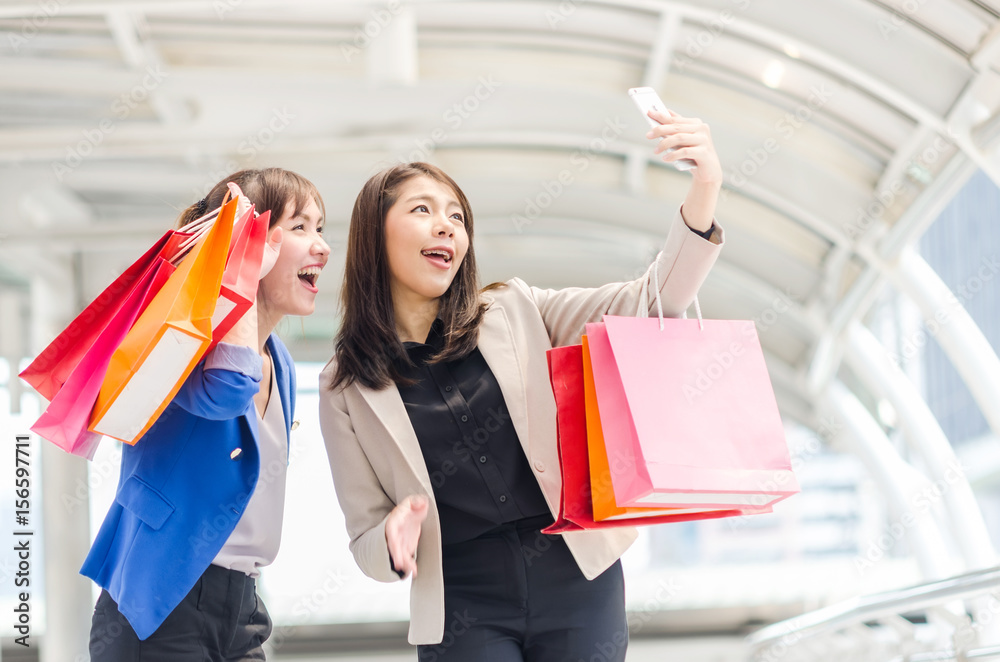 Happy shopping asia women with shopping bags. Happy shopping asia women with shopping bags.