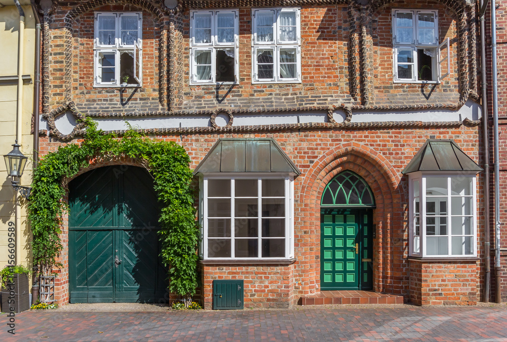 Historic house with green door in Luneburg
