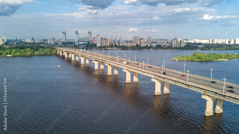 Aerial top view of Paton bridge and Dnieper river from above, city of Kiev, Ukraine
