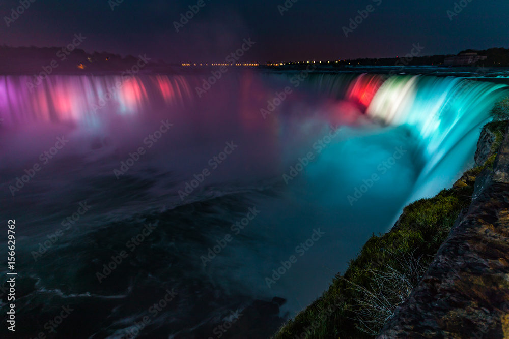Colorful Niagara Falls Horseshoe Waterfall Light Show Long Exposure at Night