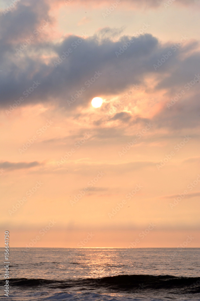 Glowing and Golden Summer Seashore Sunrise Over the Ocean
