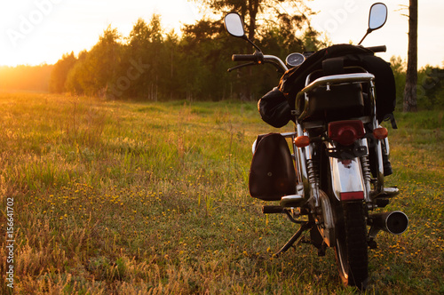 classic motorcycle at sunset,