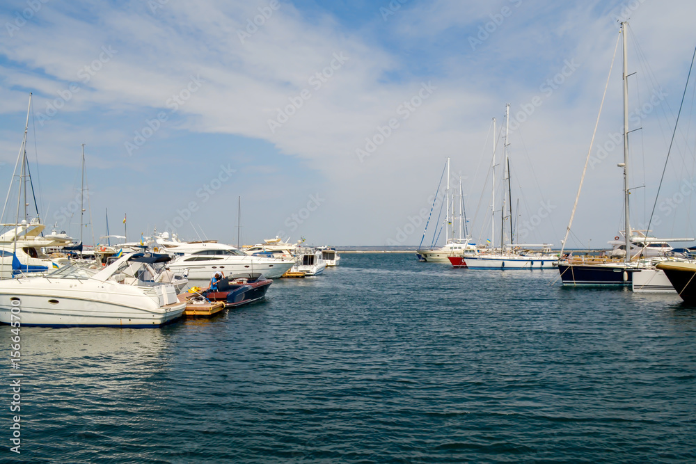 Yacht seaport, landscape view. Blue sky, summer tourism