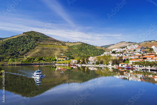 Landscape and vineyards in Douro valley with Pinhao village, Portugal photo