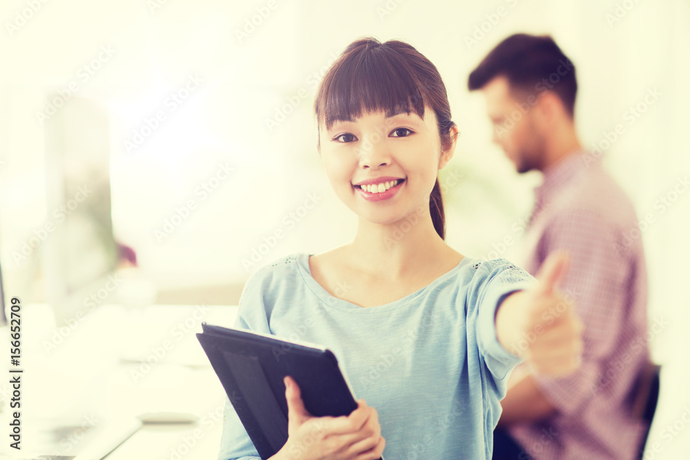 happy creative female office worker with tablet pc happy creative female office worker with tablet pc
