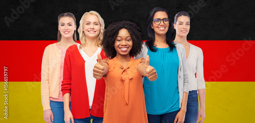 international german women showing thumbs up