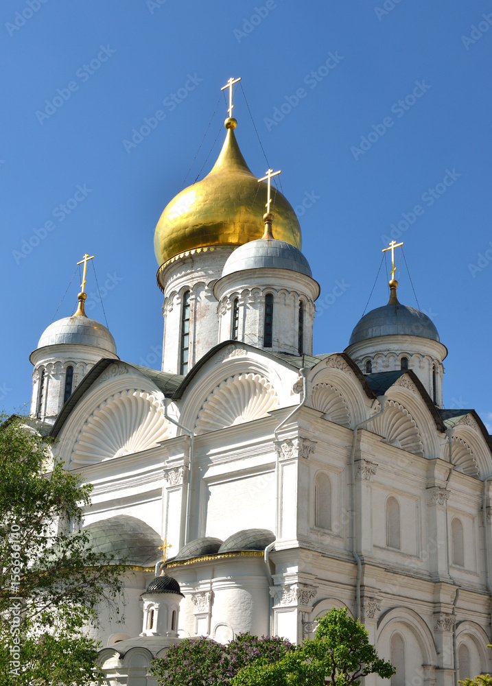 Domes of Russian Orthodox church dedicated to Archangel Michael at Cathedral Square in Moscow Kremlin, Russia. Spring