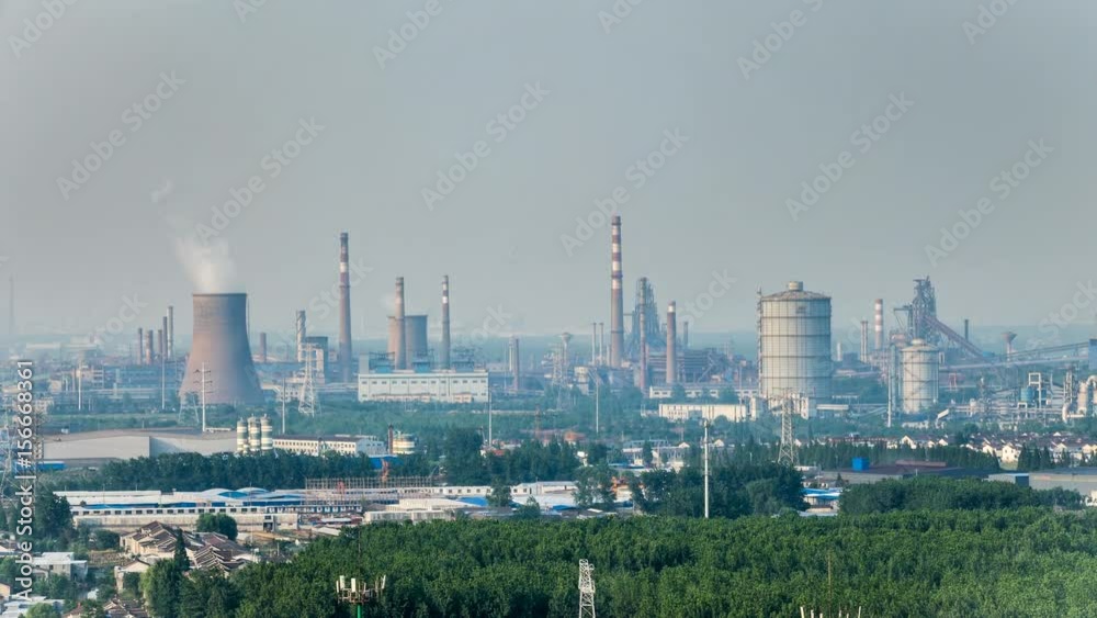Oil and gas refinery at twilight - factory smoke stack - Time lapse Oil and gas refinery at twilight - factory smoke stack - Time lapse