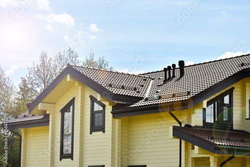 Part of the facade of a wooden house in modern style