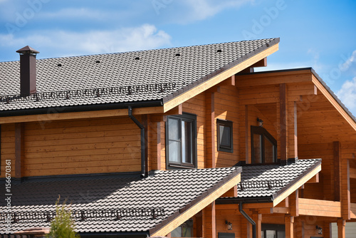 Part of the facade of a wooden house in modern style