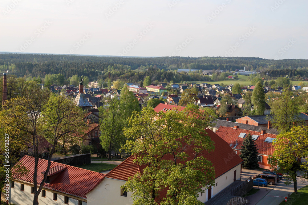 Fototapeta premium Aerial view over the center of Cesis old town of the Western Tower of the Cesis Castle. View on old street in Cesis city. Latvia, Europe. 