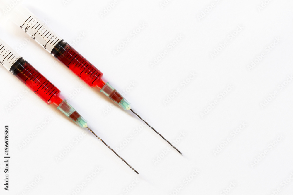 Syringe closeup isolated on white background Syringe closeup isolated on white background