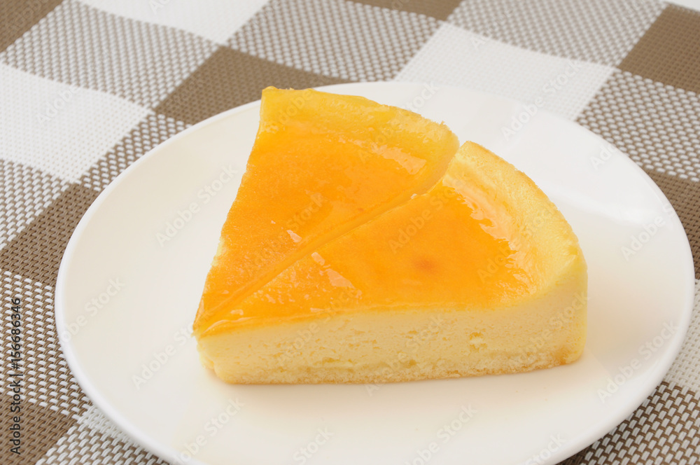 お皿にのせたチーズケーキ お皿にのせたチーズケーキ