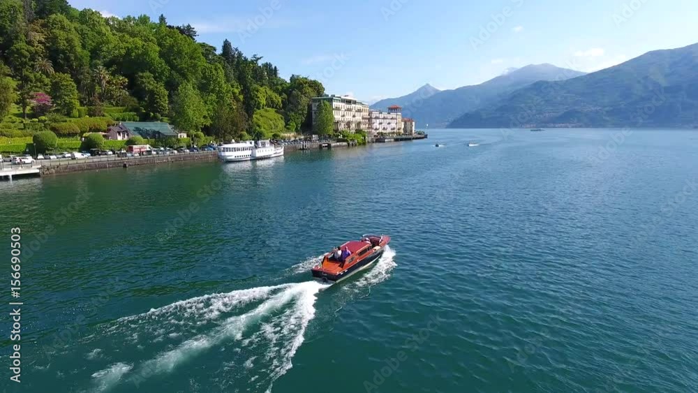Boat with passengers on Como lake - Cadenabbia and Tremezzo