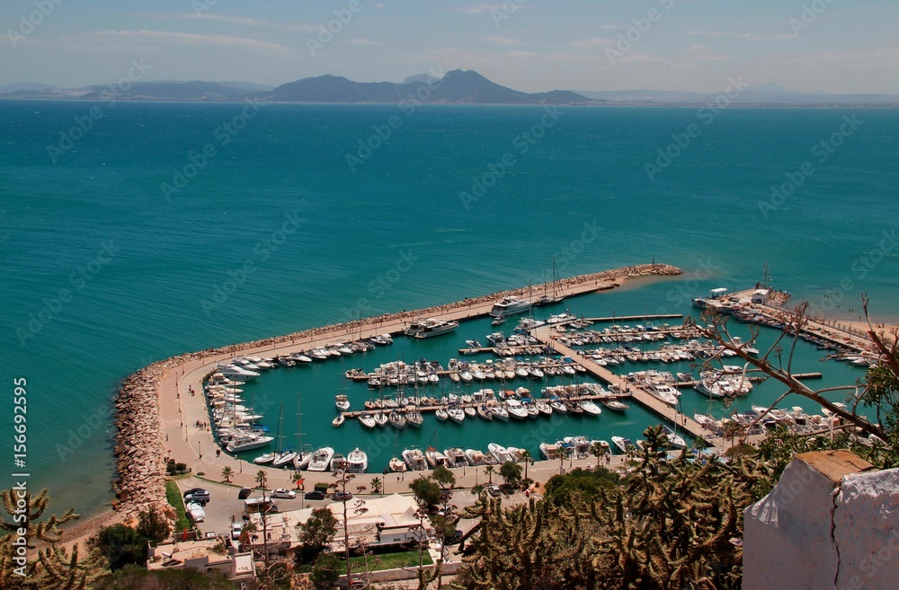 View of the port of Sidi Bou Said, Tunisia/ Top view of the port of Sidi Bou Said in Tunisia with yachts, mountains and azure water