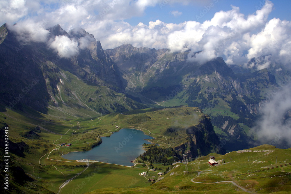 Stunning view of the lake Truebsee and the mountain range of the Uri Alps with Mount Titlis, Switzerland