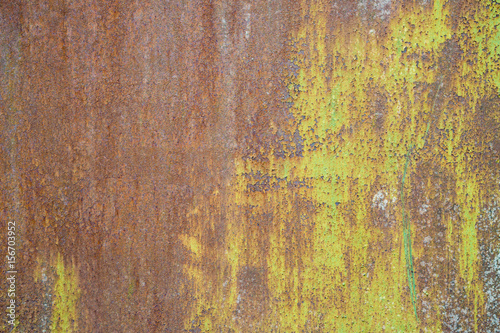 green withered paint on rusty metal grunge texture
