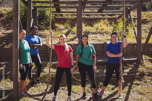 Group of fit women standing together in the boot camp