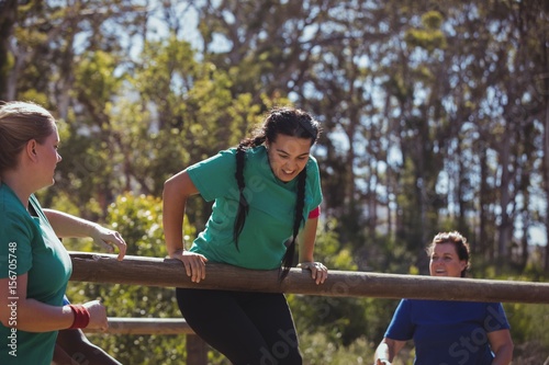 Fit women training on fitness trail in the boot camp