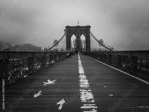 Brooklyn bridge walkway and mist in black and white style