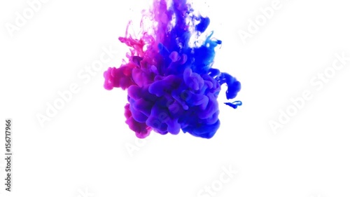 Red and blue paint streaming into water to form colorful inky clouds