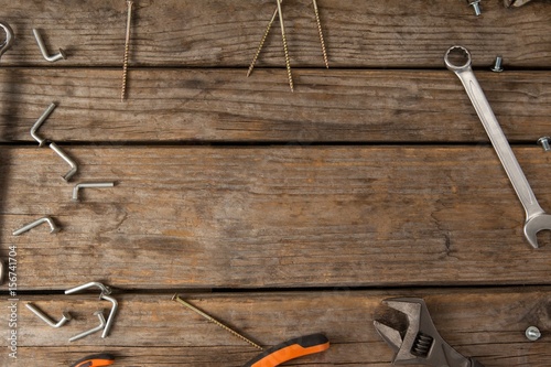 Worktools on wooden plank